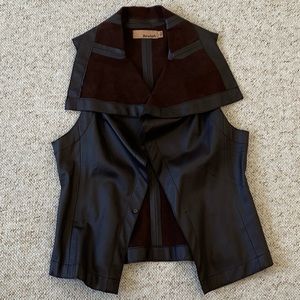 Chocolate brown leather and suede vest.